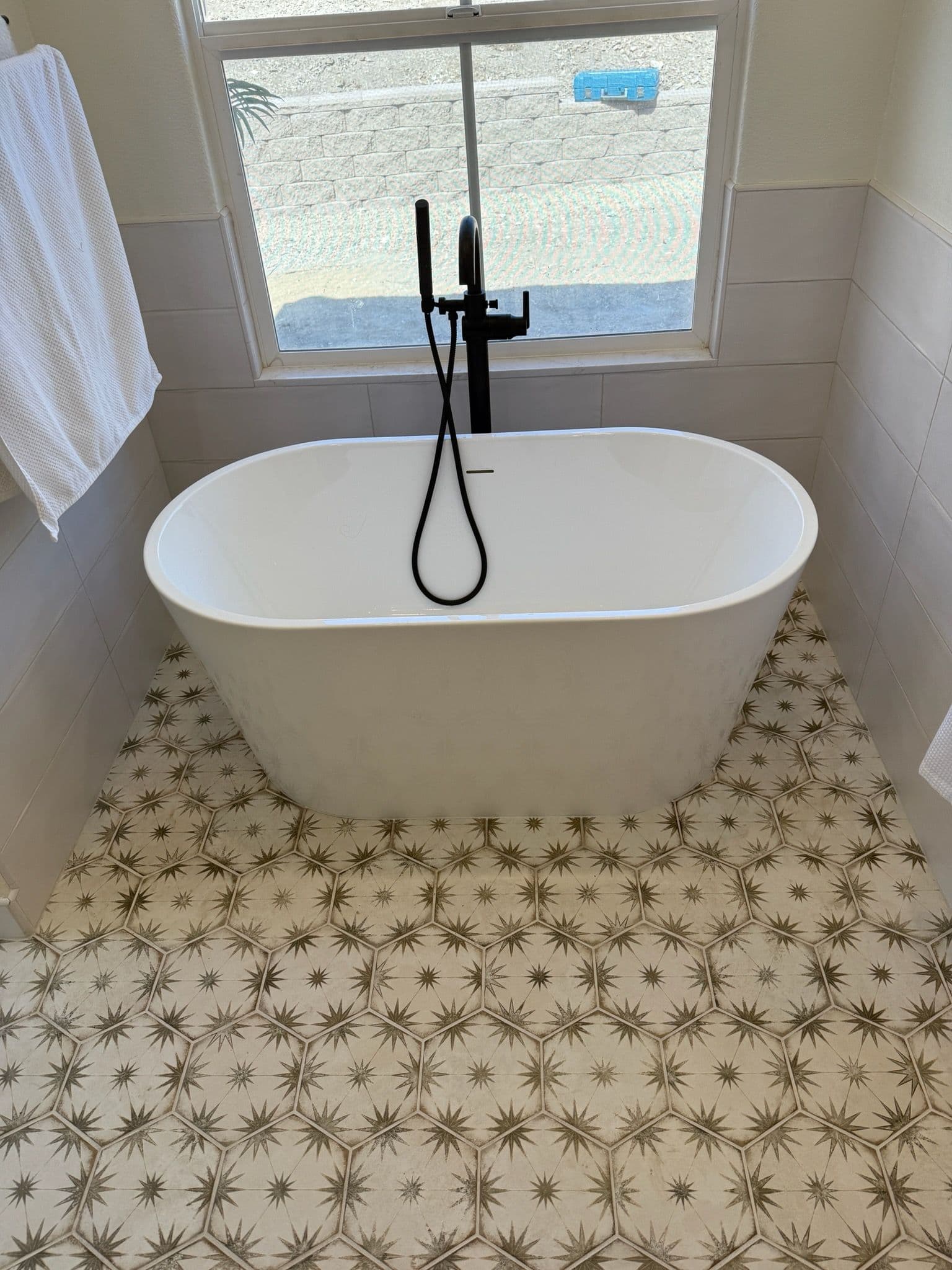 Project Bathroom Makeover with Elegant Tub and Faucet image